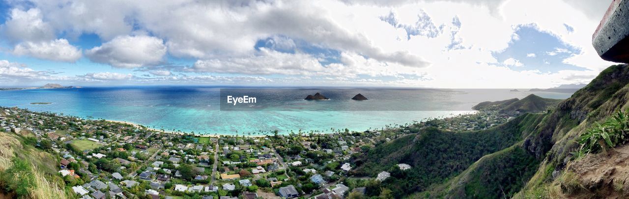 PANORAMIC VIEW OF BEACH AGAINST SKY