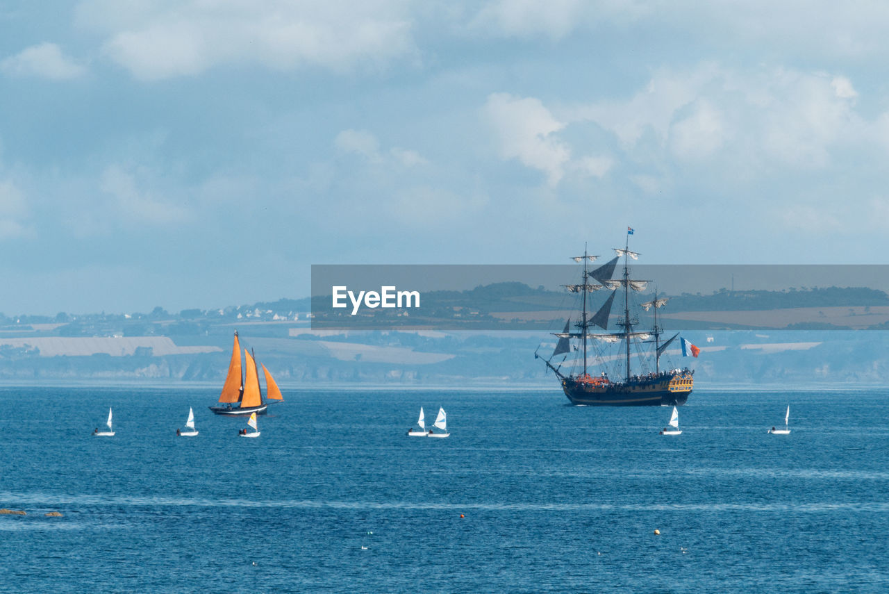 Boats sailing in sea