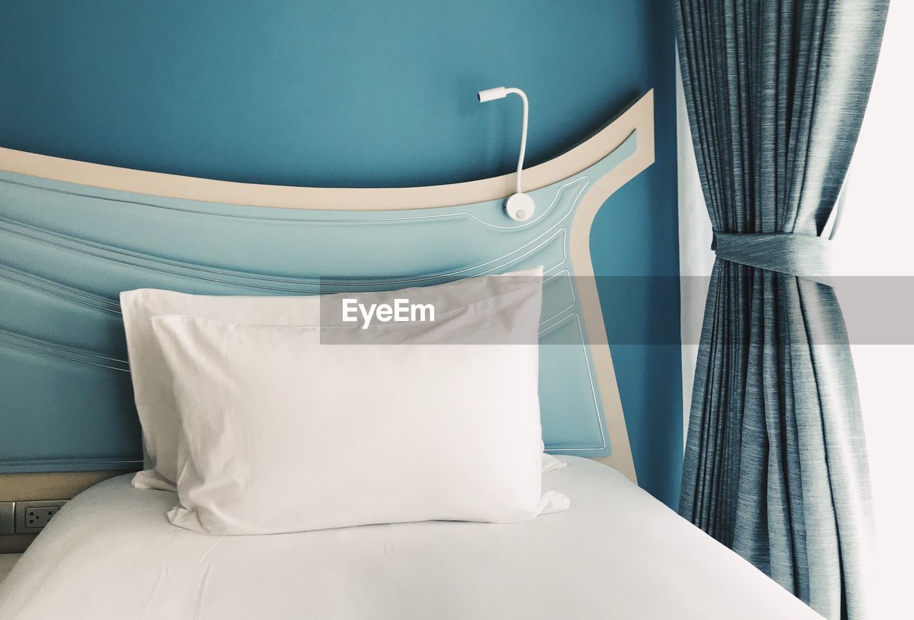 Pillow on bed at home