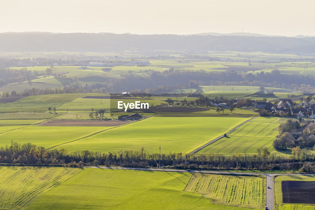 SCENIC VIEW OF FARM AGAINST SKY