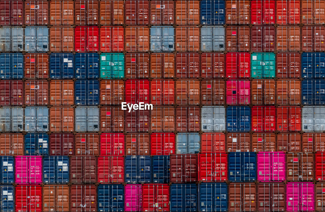 Stack of logistics container. cargo and shipping business. container ship for export logistics.