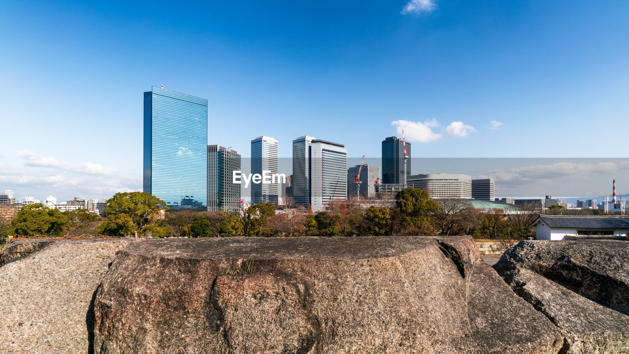 MODERN BUILDINGS AGAINST SKY IN CITY