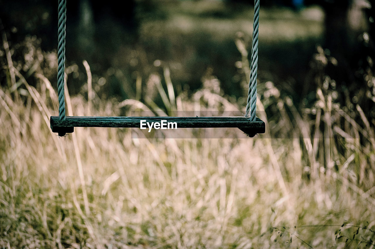 Close-up of swing in playground