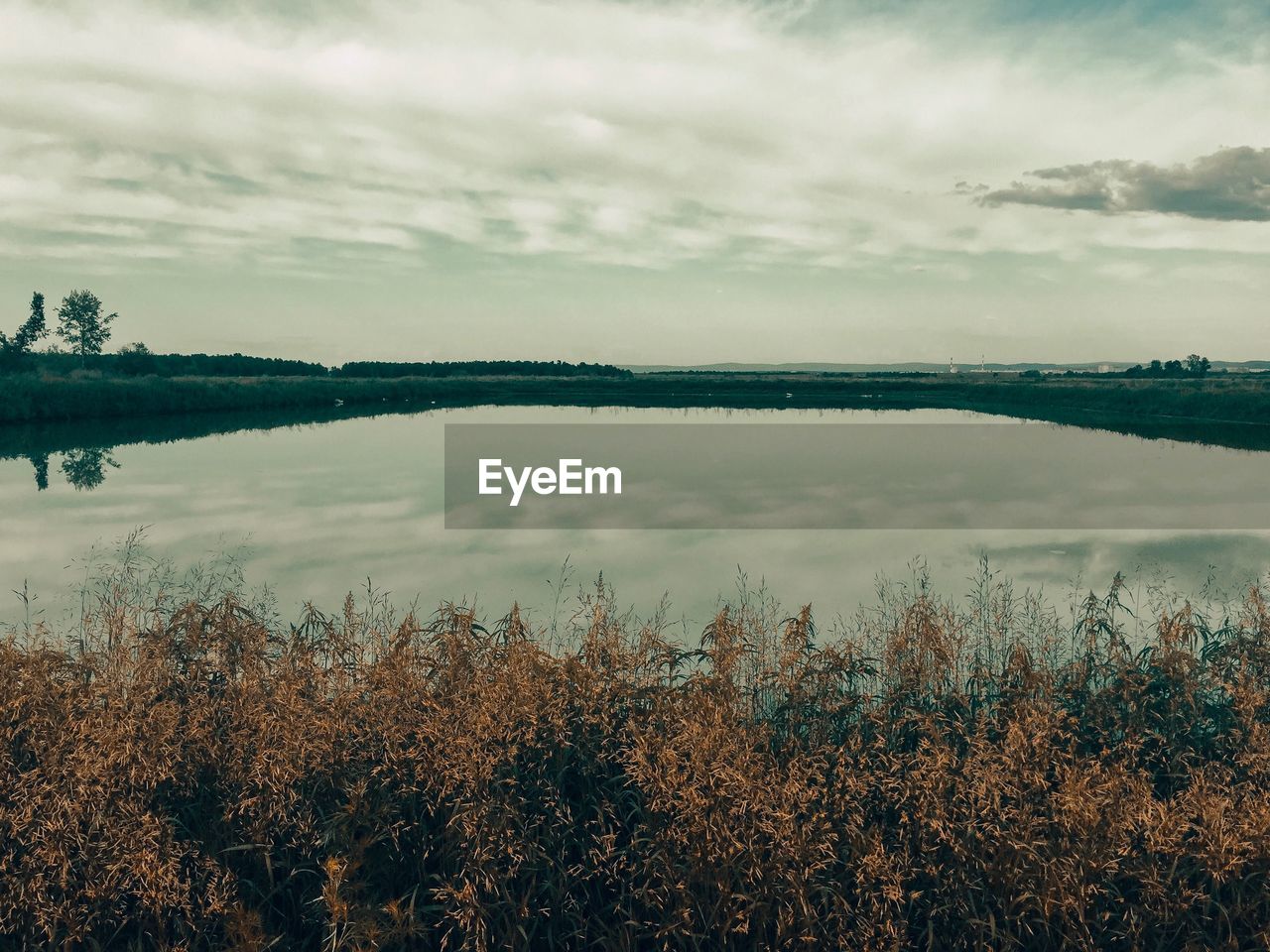 Scenic view of lake against sky