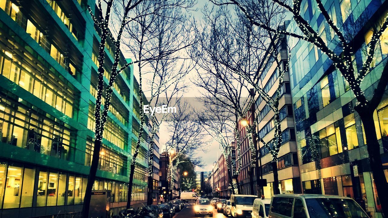LOW ANGLE VIEW OF BUILDINGS IN CITY