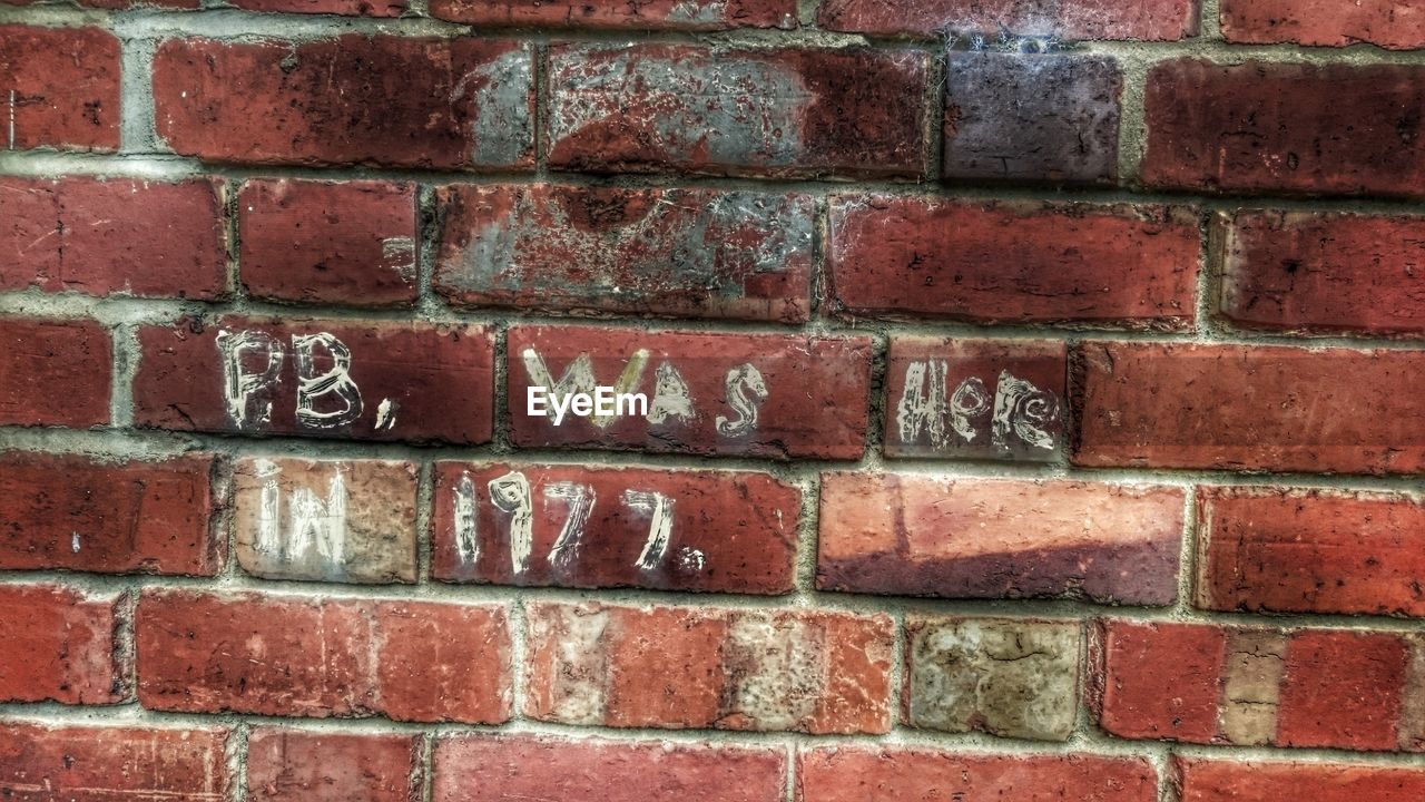 CLOSE UP OF RED BRICK WALL