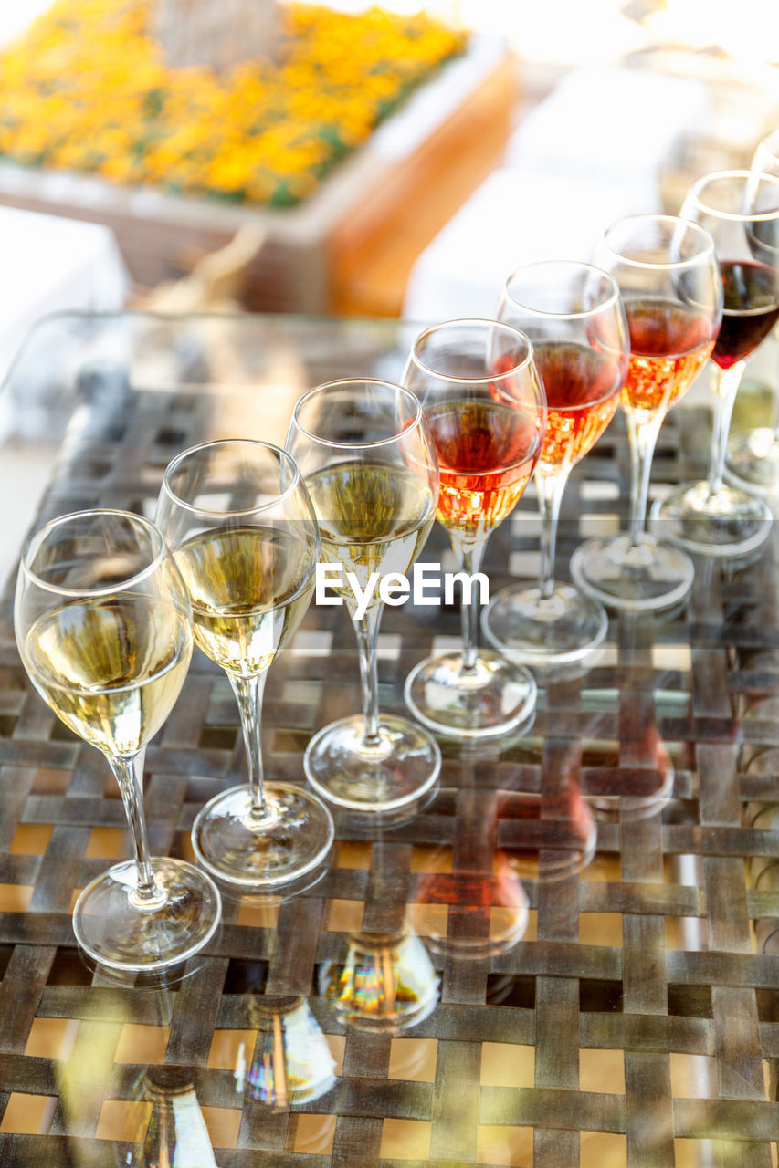 close-up of wine glasses on table