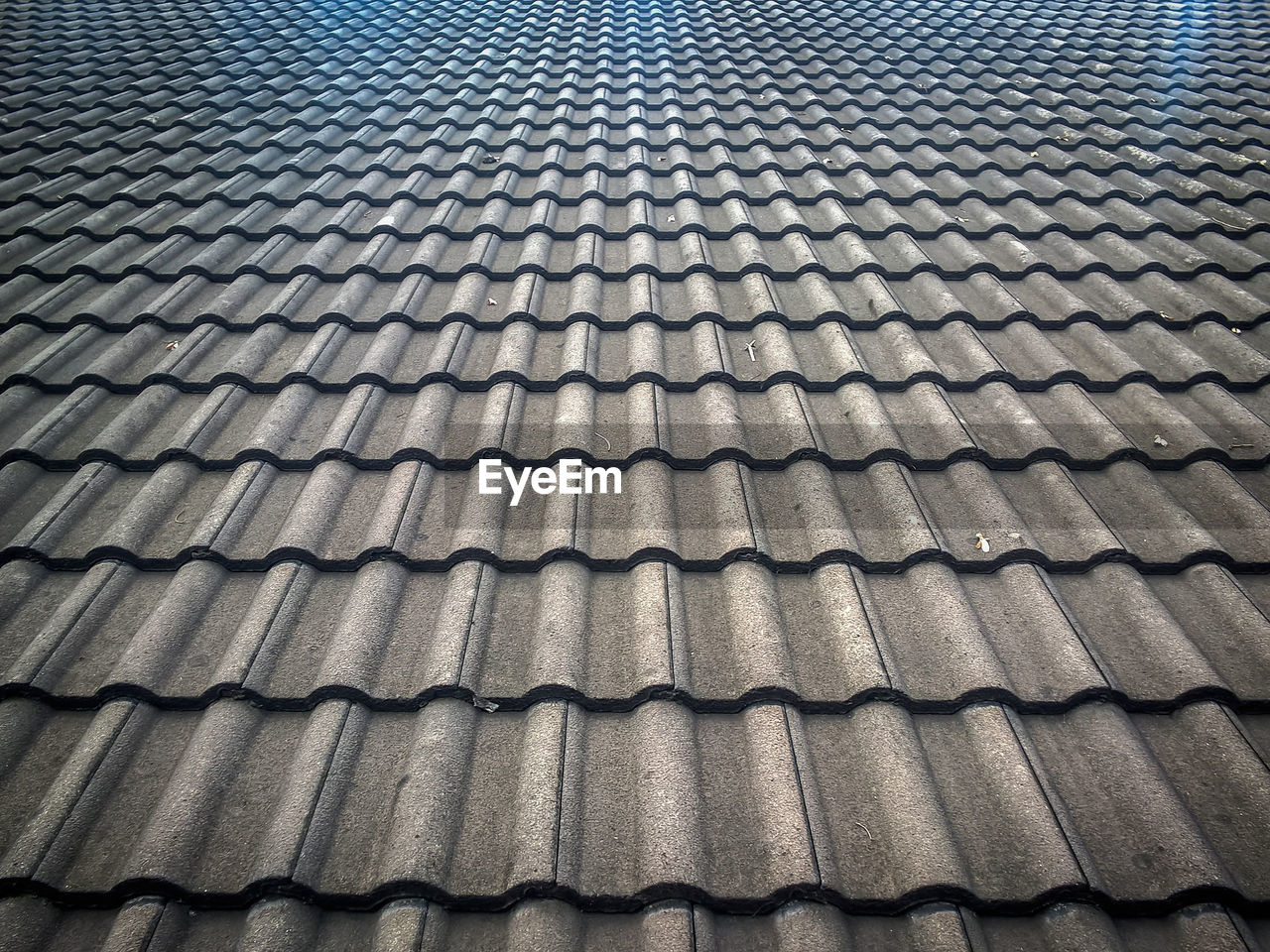 CLOSE-UP OF ROOF TILES