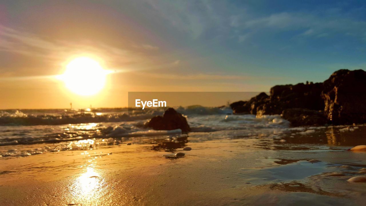 SCENIC VIEW OF SEA AND SUNSET SKY