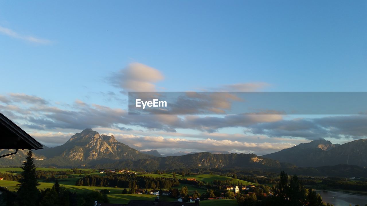 Landscape with mountain range in background