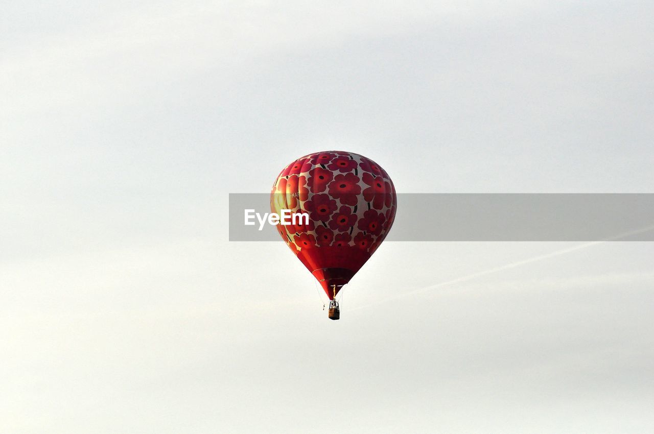 Low angle view of hot air balloons against sky