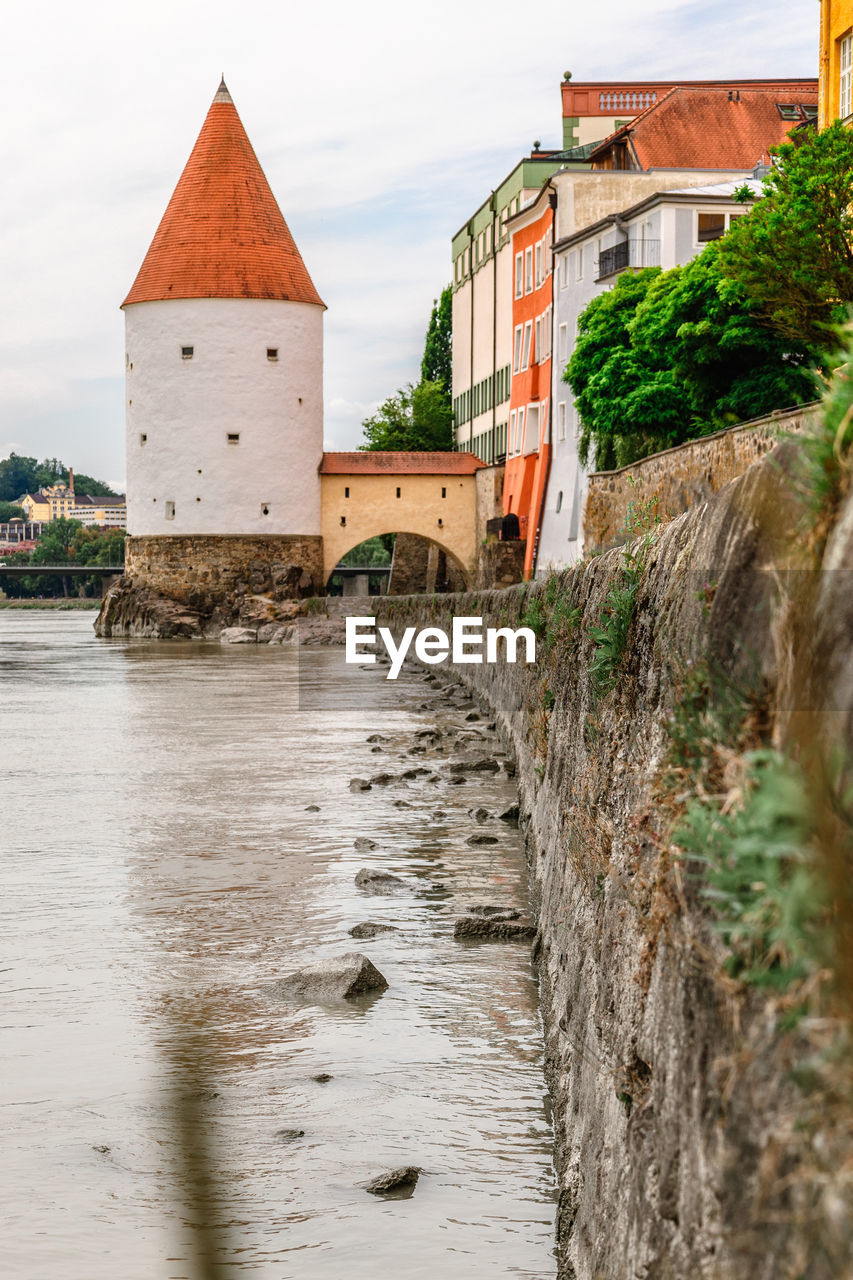 buildings by river