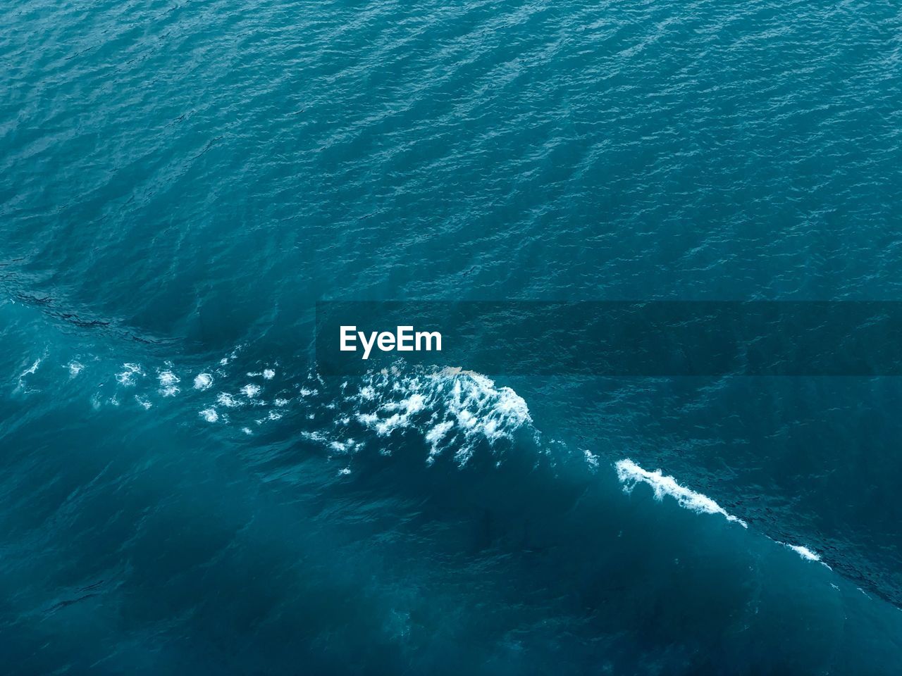 High angle view of waves in sea 