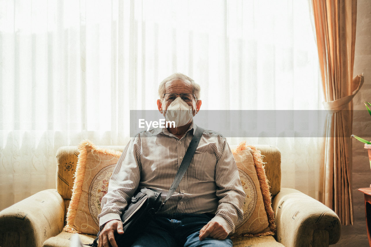 Old man with safety implements during quarentine