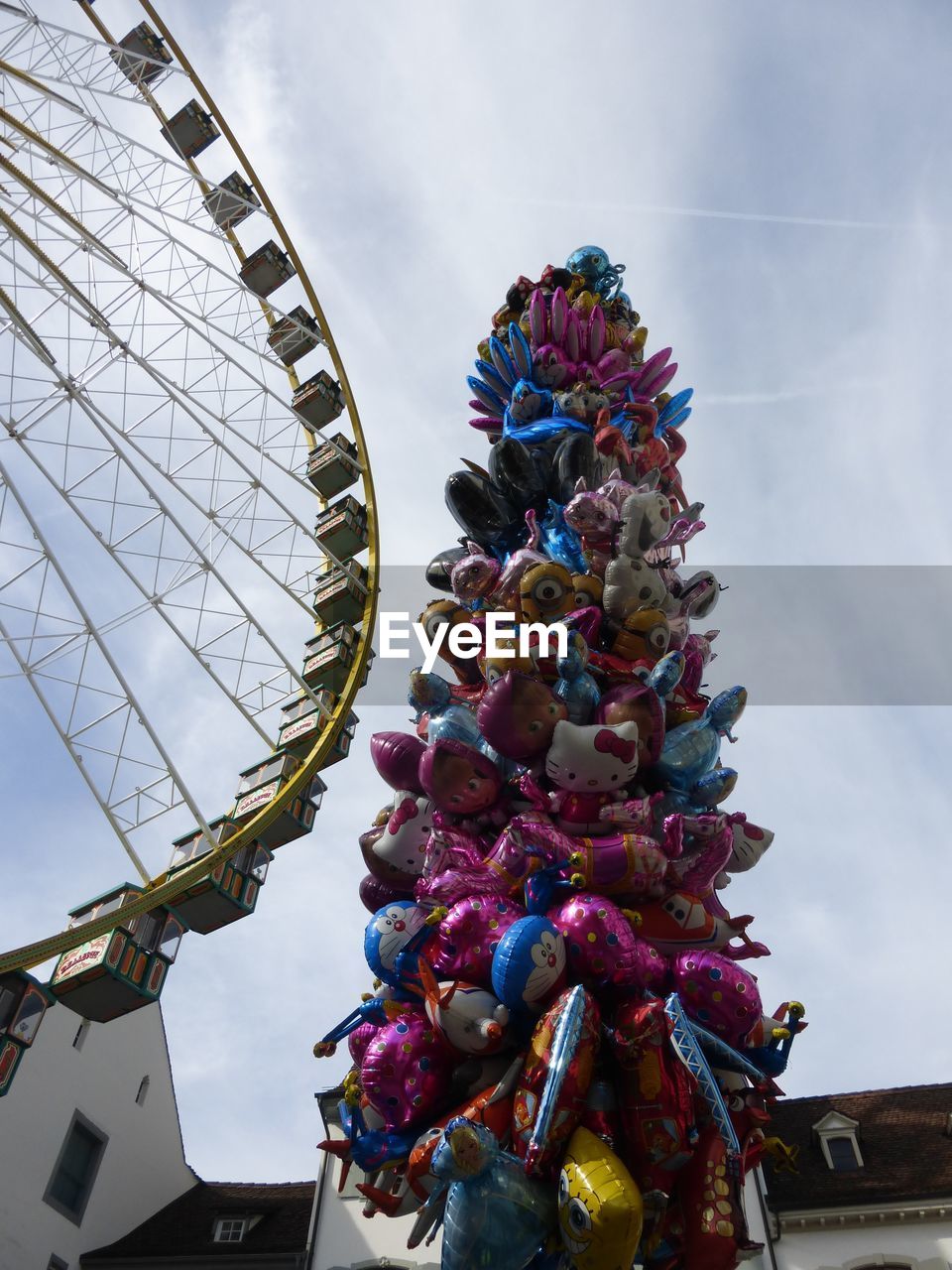 LOW ANGLE VIEW OF FERRIS WHEEL AGAINST SKY