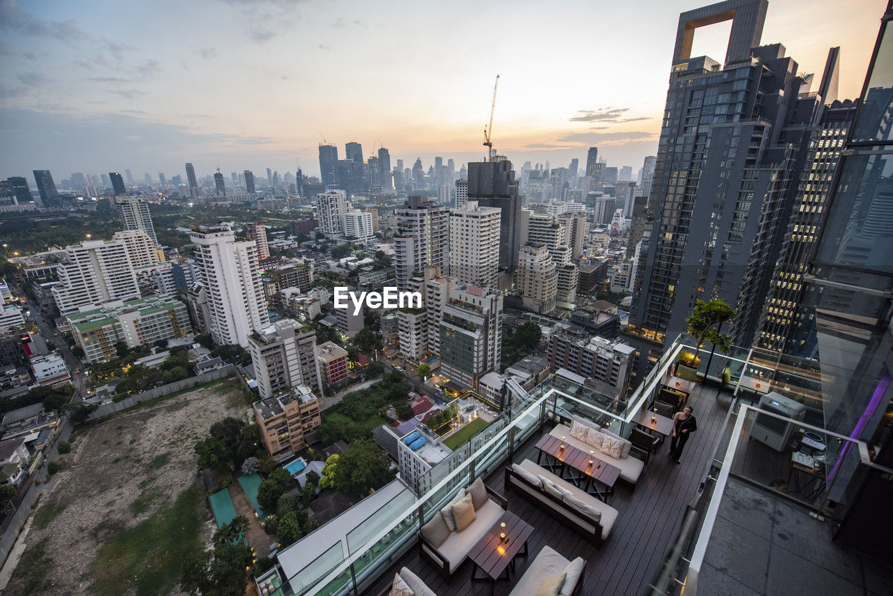 high angle view of buildings in city against sky