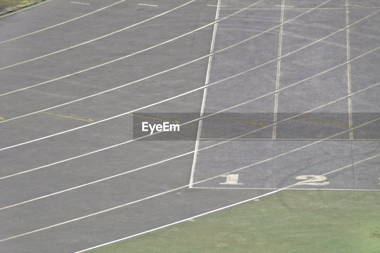 High angle view of empty running track in stadium 