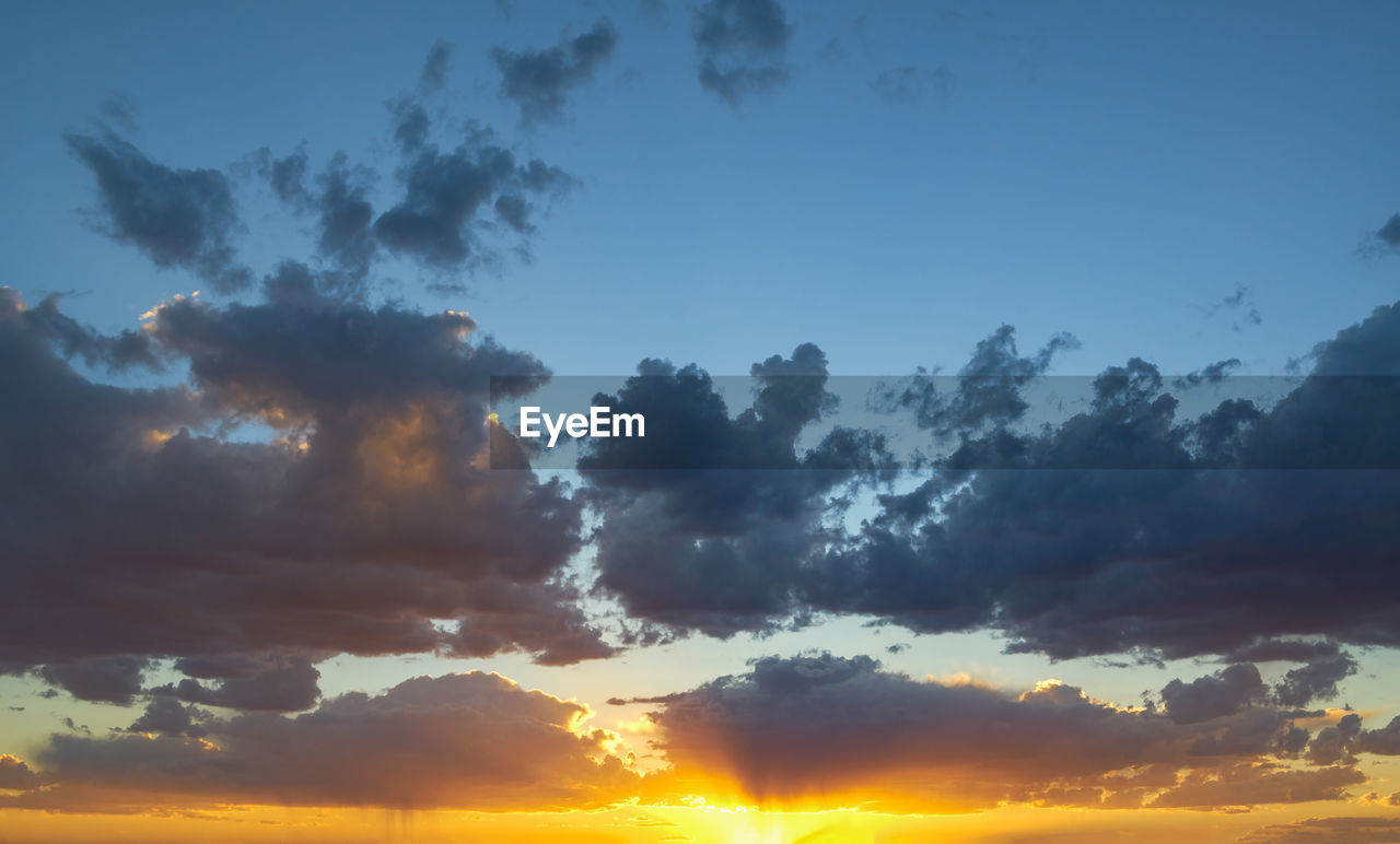 LOW ANGLE VIEW OF DRAMATIC SKY