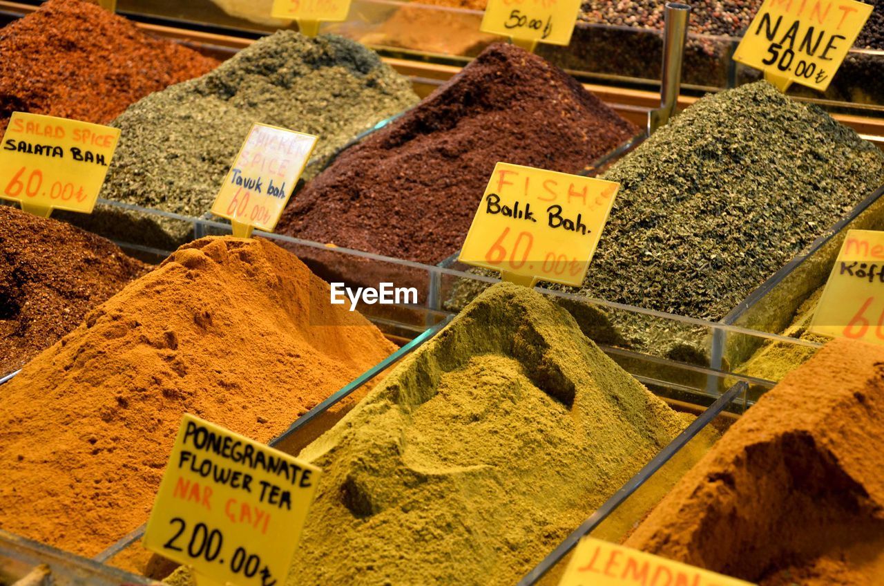 Variety of spices for sale at market stall