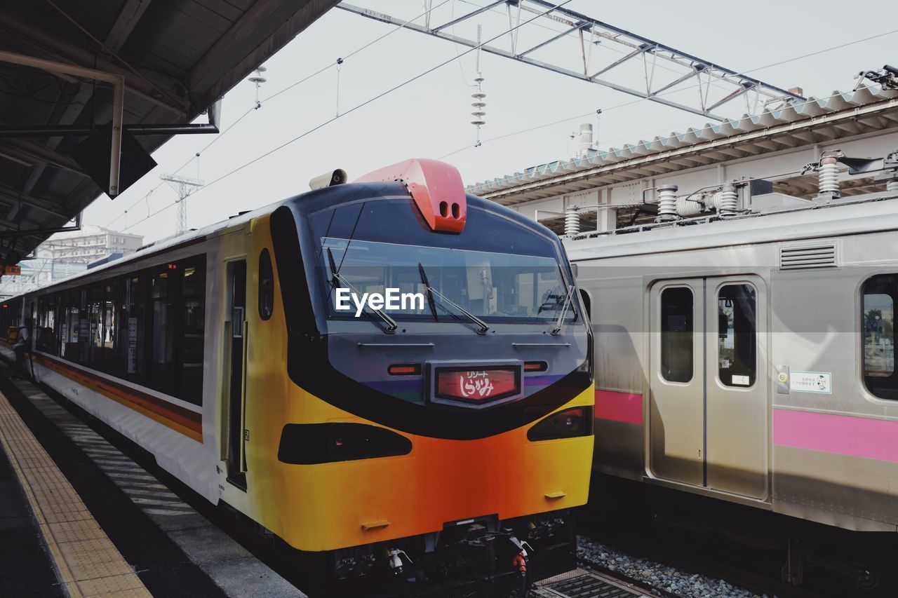 TRAIN ON RAILROAD STATION