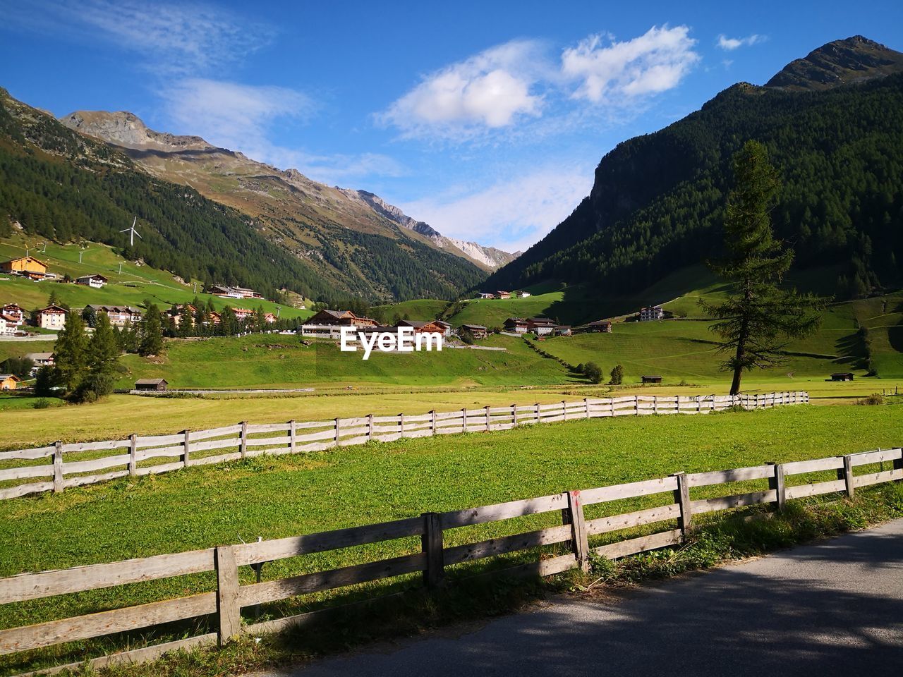 Scenic view of landscape and mountains against sky