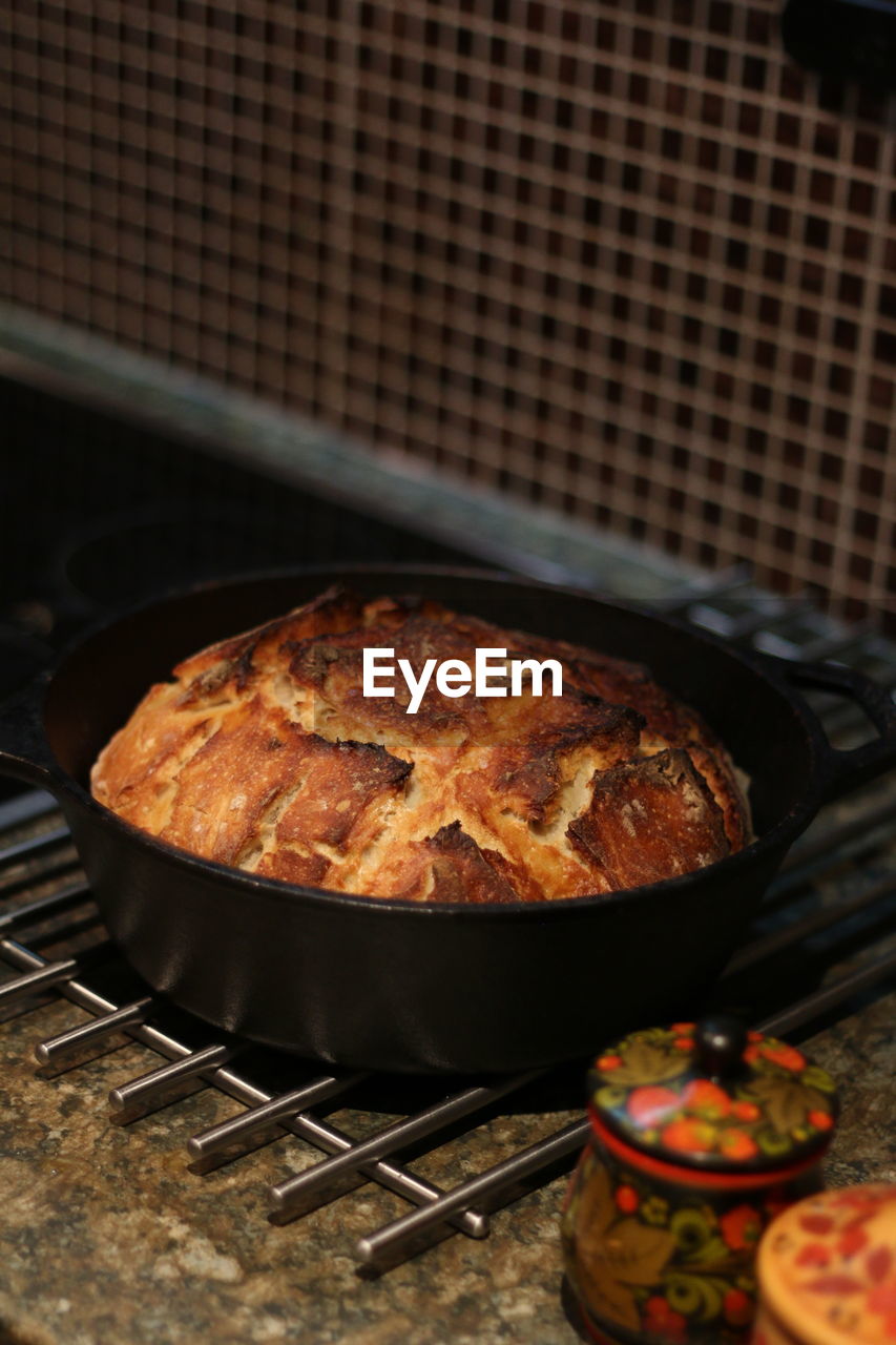 High angle view of fresh bread in cooking pan