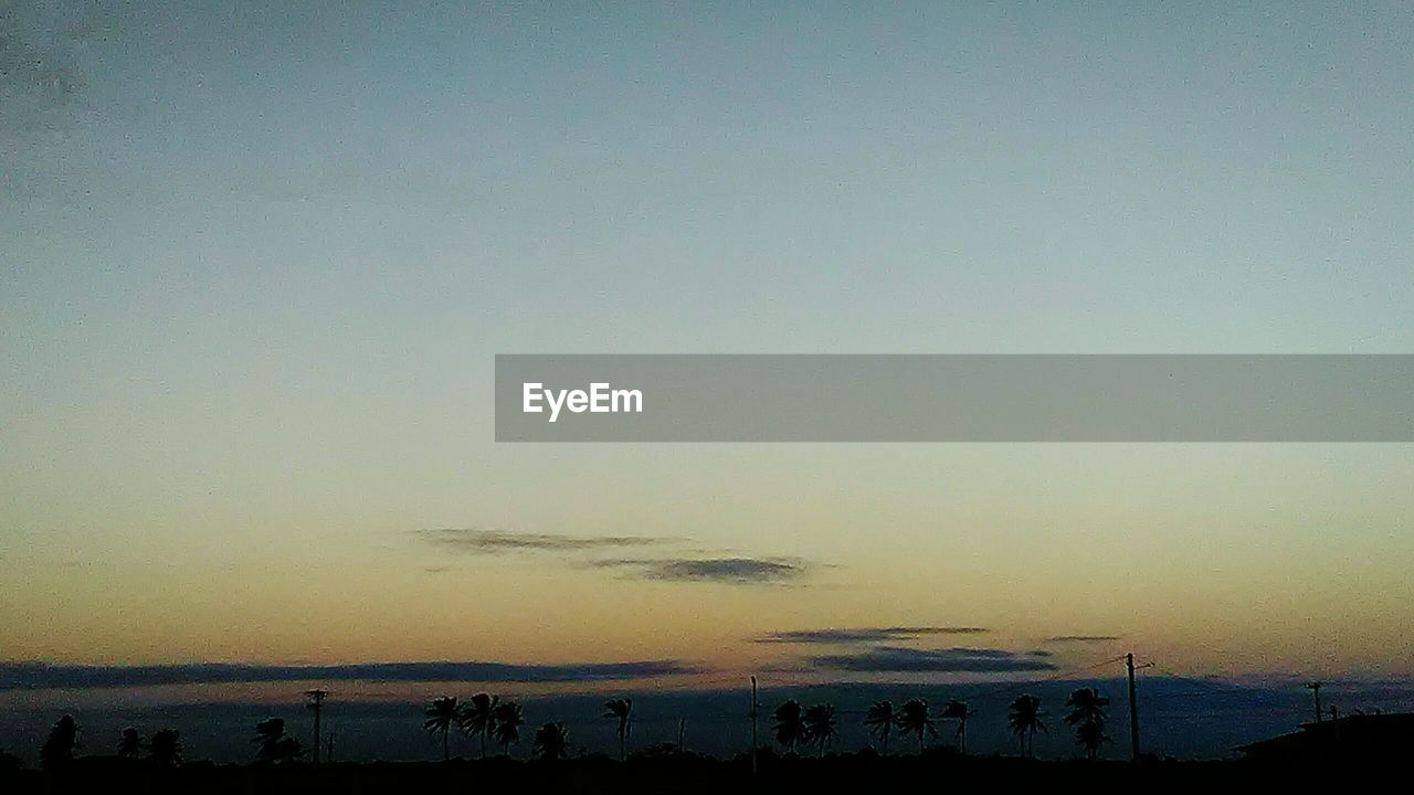 VIEW OF SEA AT SUNSET