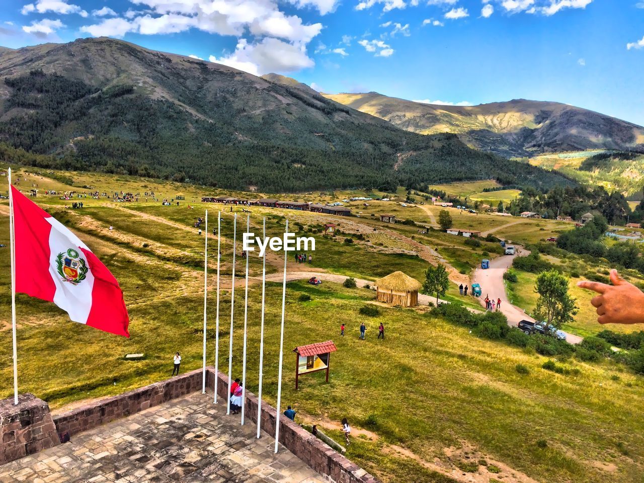 Landscape with mountain range in background