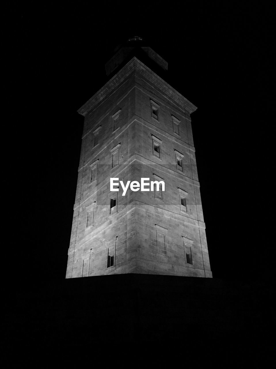 LOW ANGLE VIEW OF BUILT STRUCTURES AT NIGHT