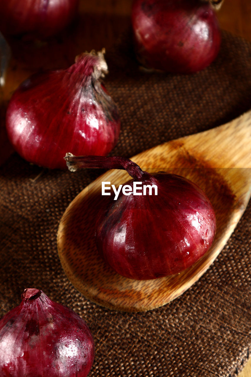 Close-up of onions on table