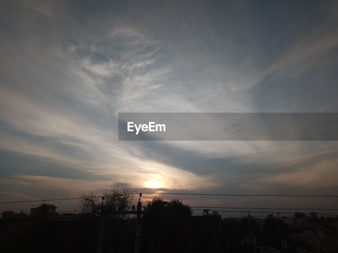 SCENIC VIEW OF SKY OVER SILHOUETTE TREES