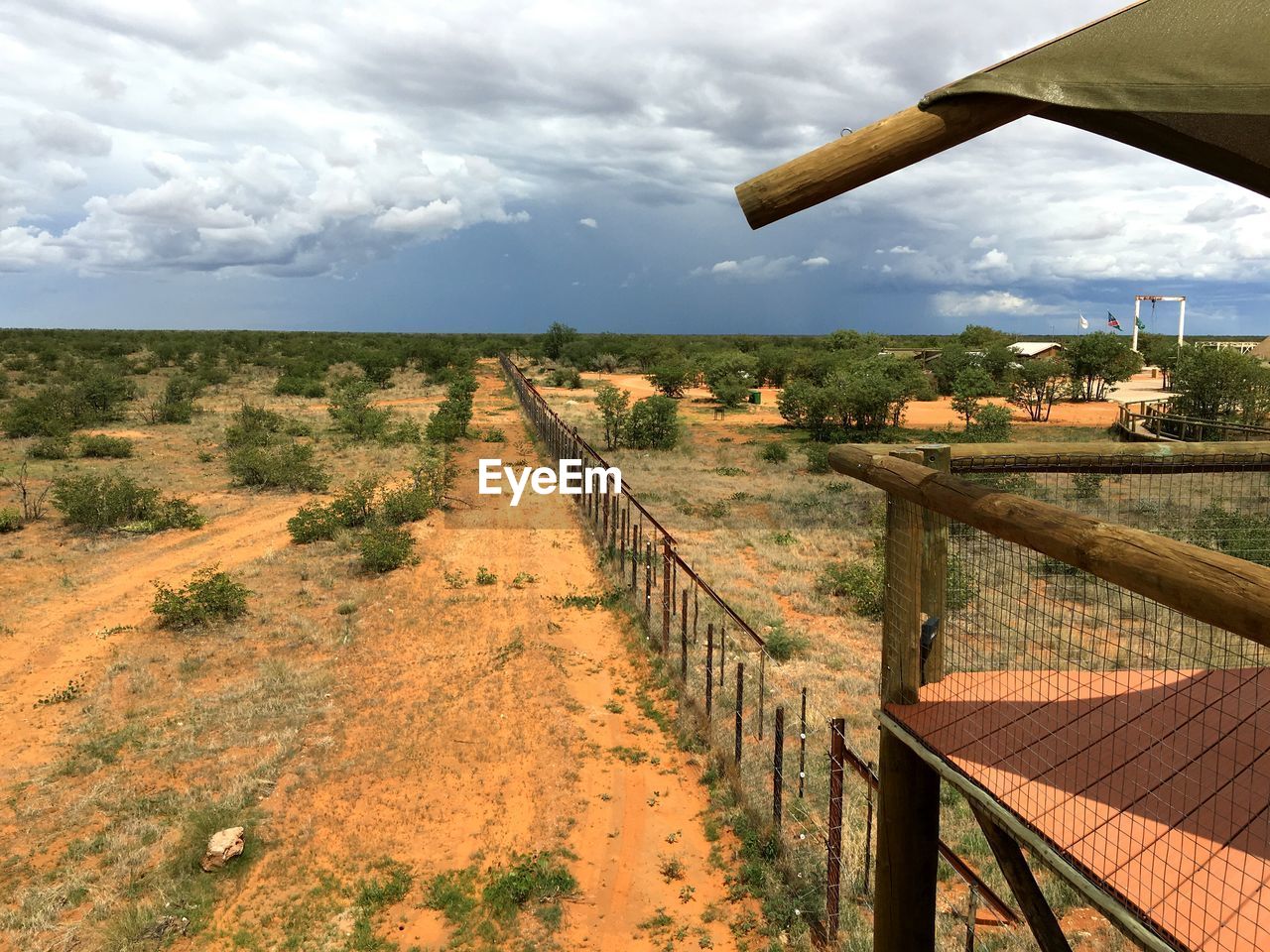 Scenic view of agricultural landscape against sky