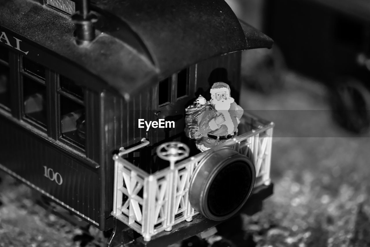 Santa at the end of train on toy train set