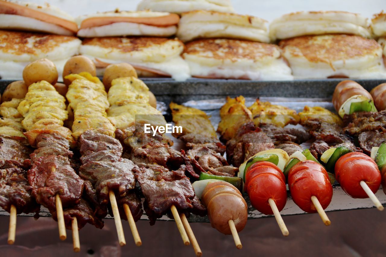 food, food and drink, skewer, brochette, freshness, pincho, kebab, meat, grilling, barbecue, dish, grilled, no people, fast food, healthy eating, satay, meal, cuisine, arrosticini, street food, barbecue grill, in a row, large group of objects, business, close-up, still life, abundance, wellbeing, heat, fruit, snack