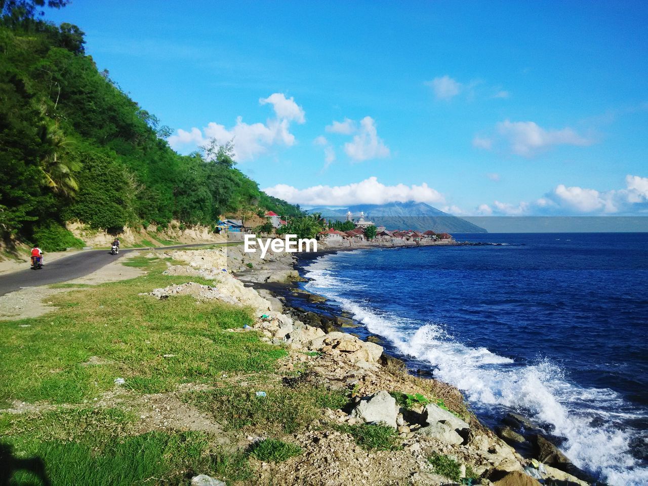 Scenic view of sea against blue sky