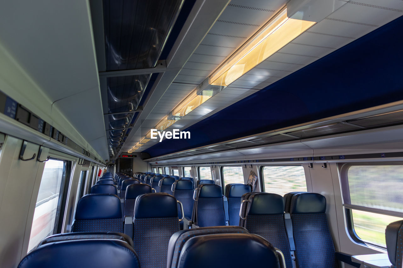 low angle view of empty seats in train