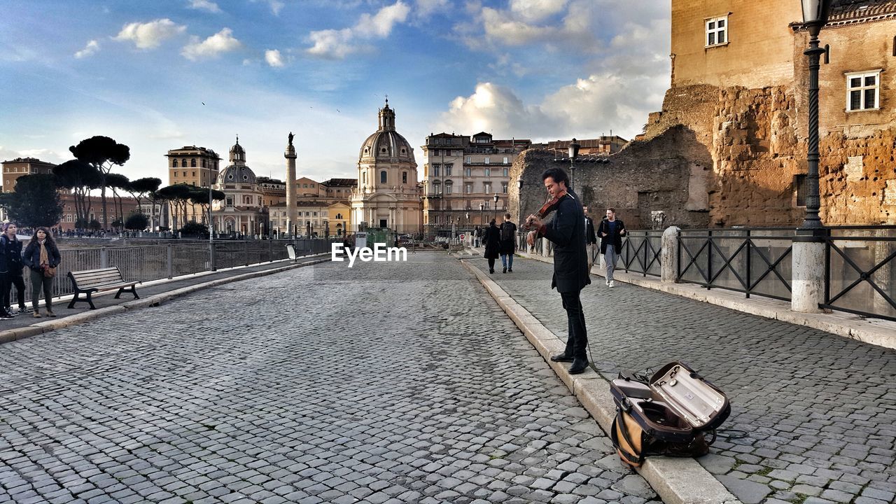 PEOPLE WALKING ON A TOWN