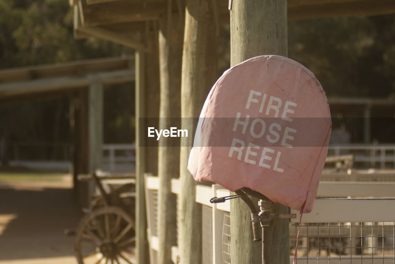 Close-up of information sign on fire hose