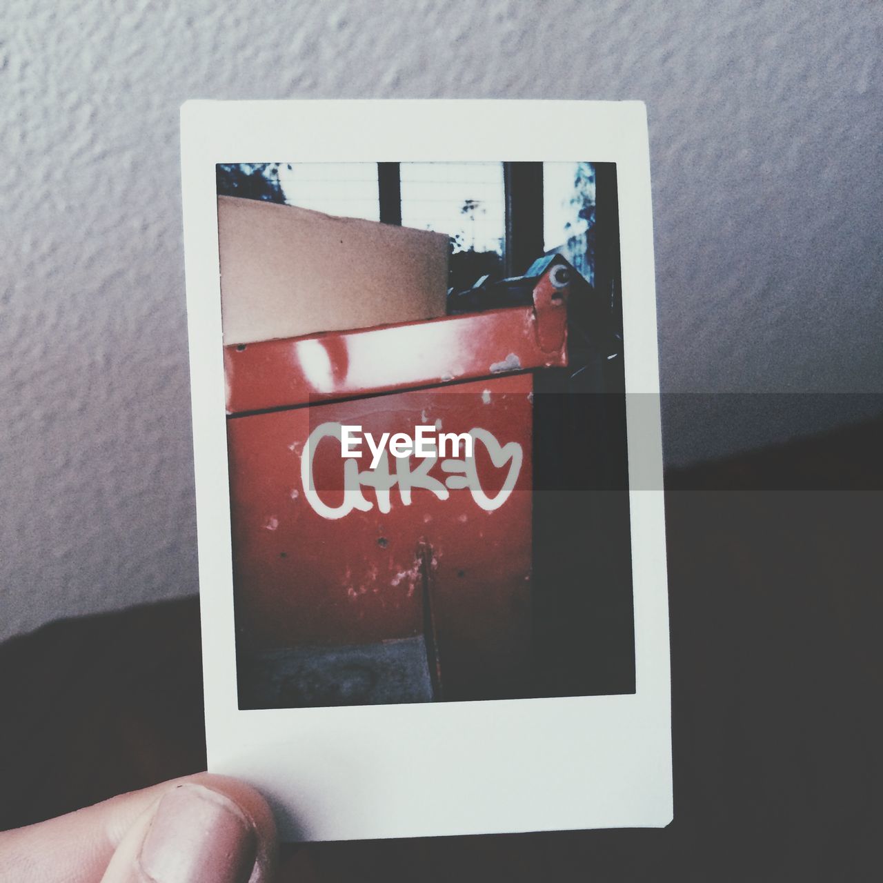 Close-up of hand holding a photo