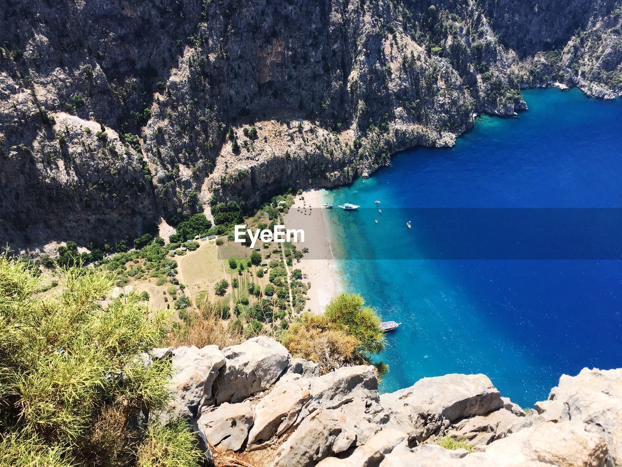 Aerial view of mountains by sea