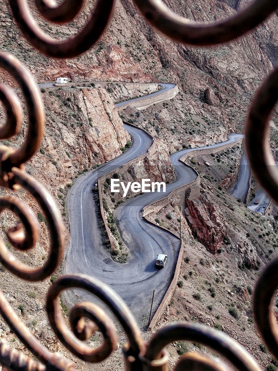 High angle view of winding road seen from metal grate at dades valley