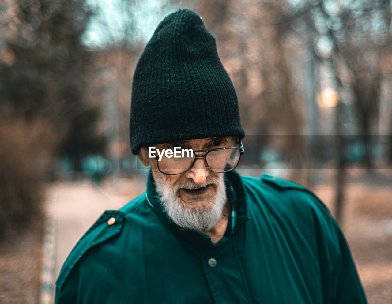 Portrait of old man wearing hat