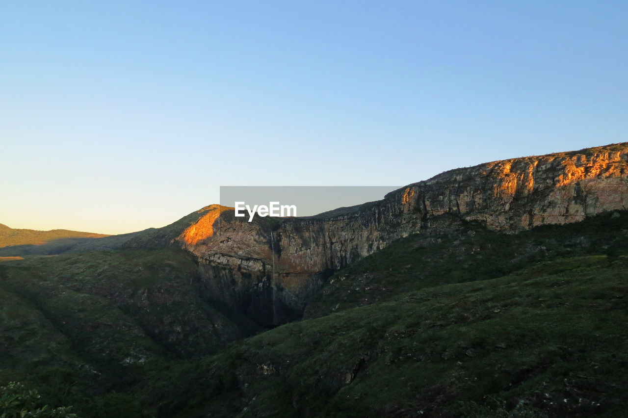 Scenic view of mountains against clear sky