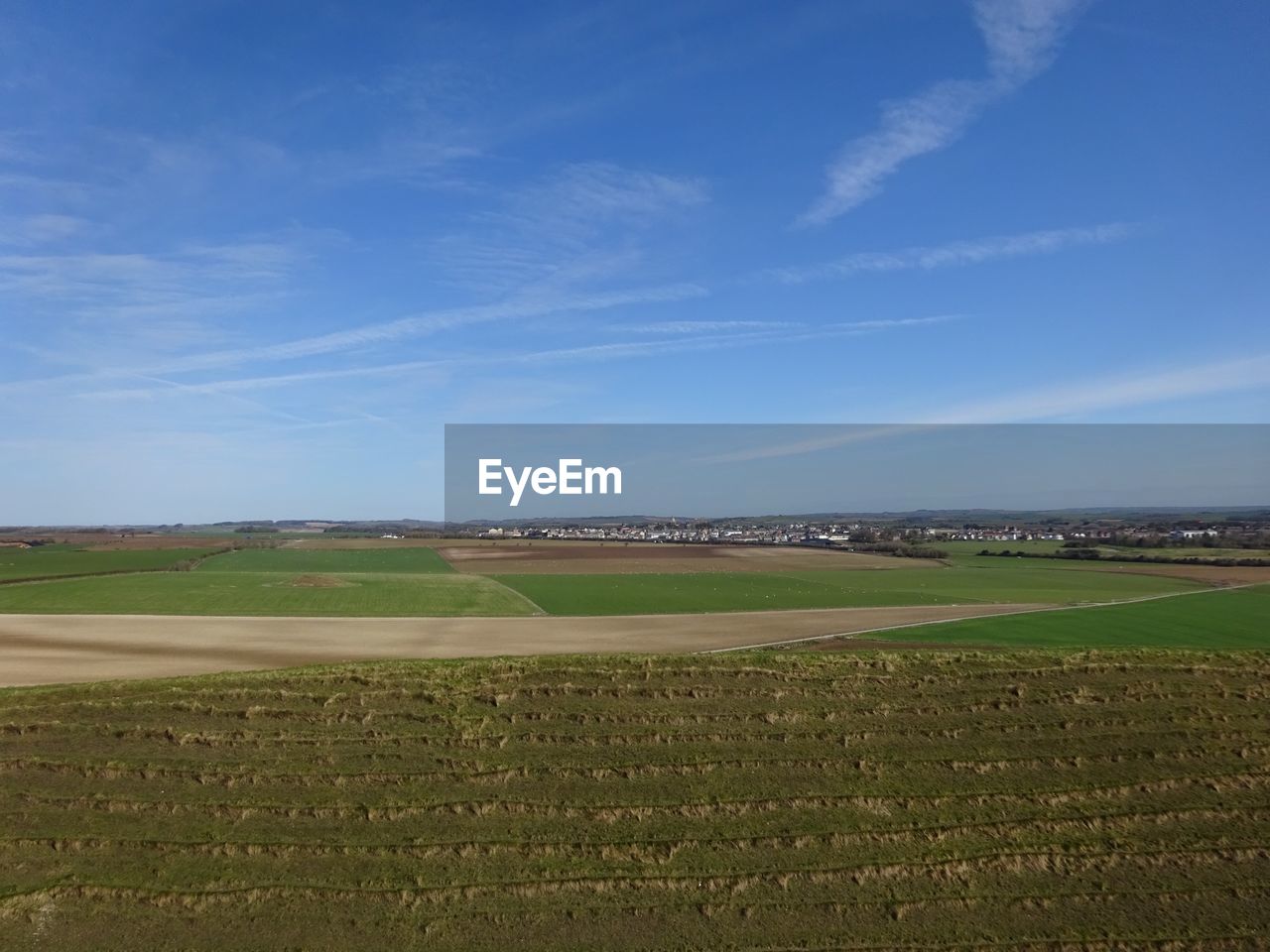 SCENIC VIEW OF FARM AGAINST SKY