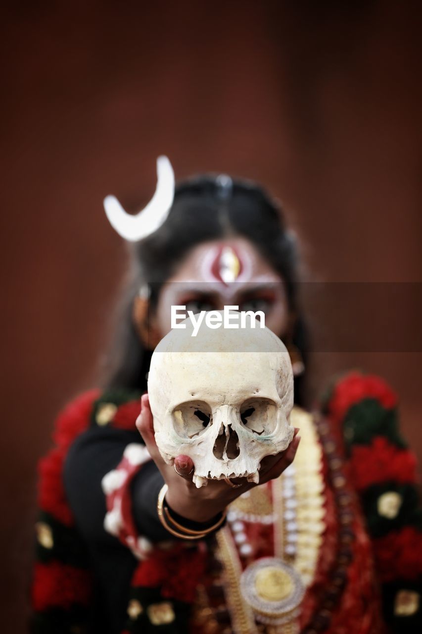 CLOSE-UP PORTRAIT OF A HUMAN SKULL