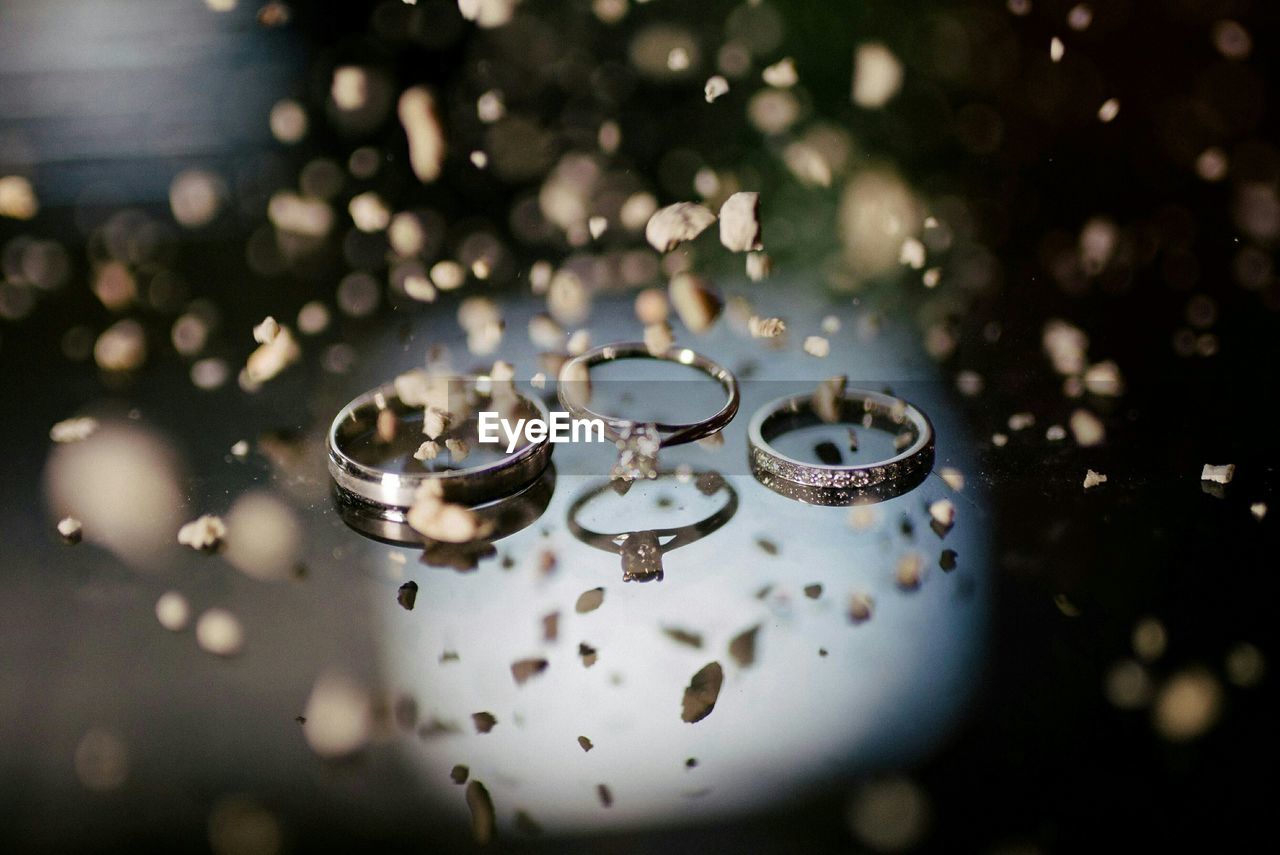 Close-up of finger rings on table