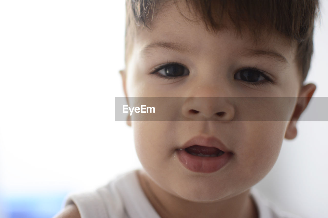 CLOSE-UP PORTRAIT OF CUTE BOY