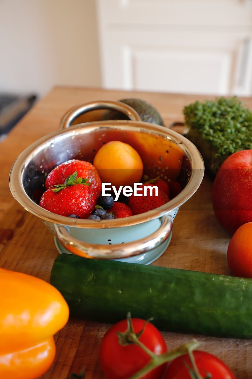 Close-up of fruits in bowl on table