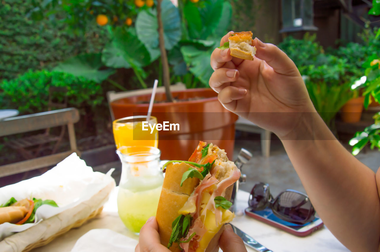 Close-up of hand holding food