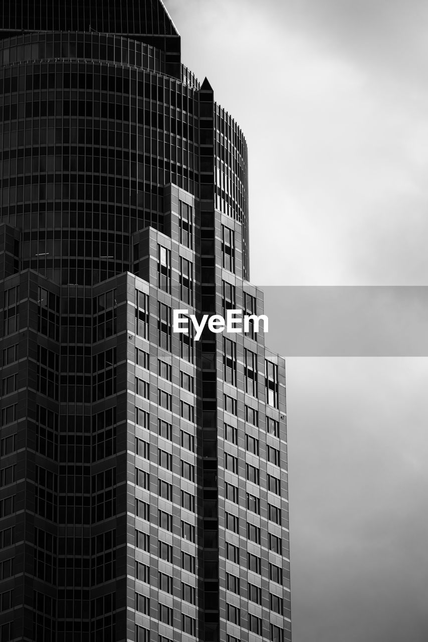 Low angle view of modern buildings against sky